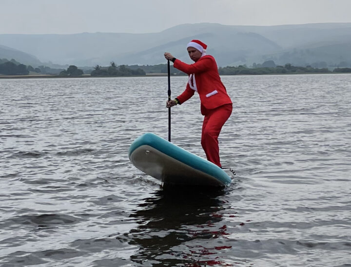 santa paddle boarding on Ullswater